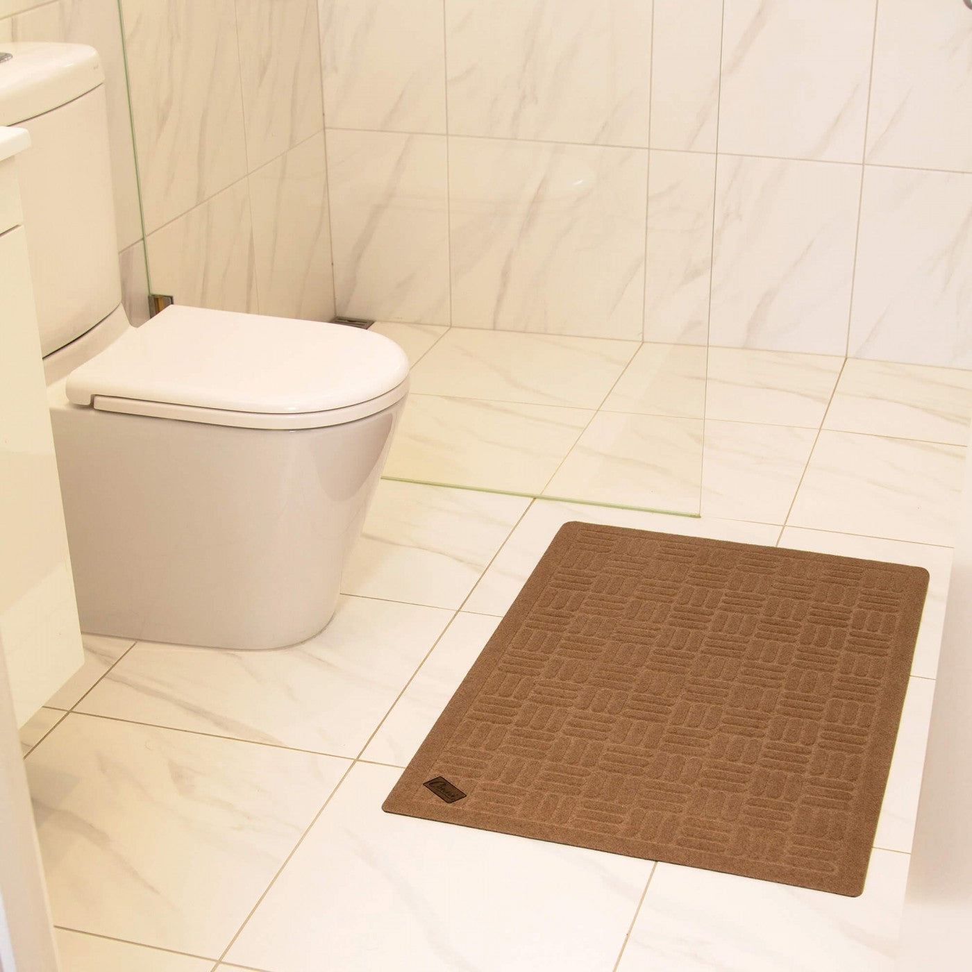 Conni anti-slip mat in bathroom pebble colour