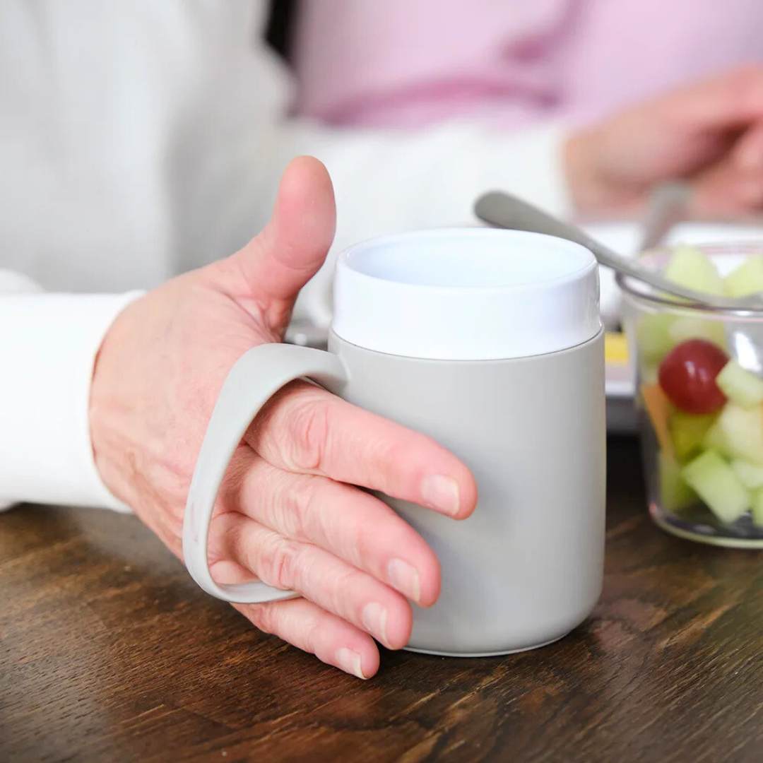 Person holding the easy hold mug