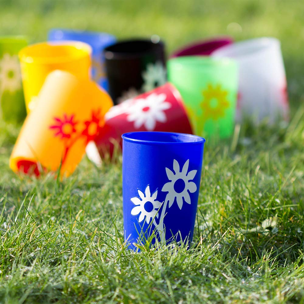 plastic cup with non slip flower motives spread out on grass