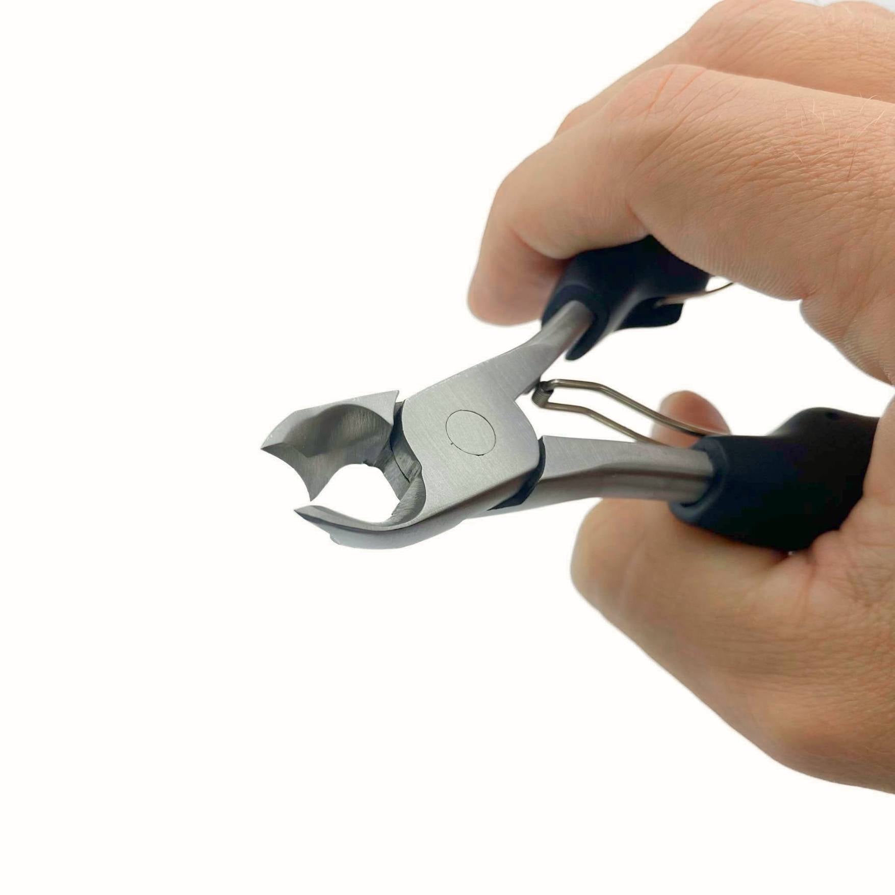hand holding thick handled podiatrist nail clippers font view