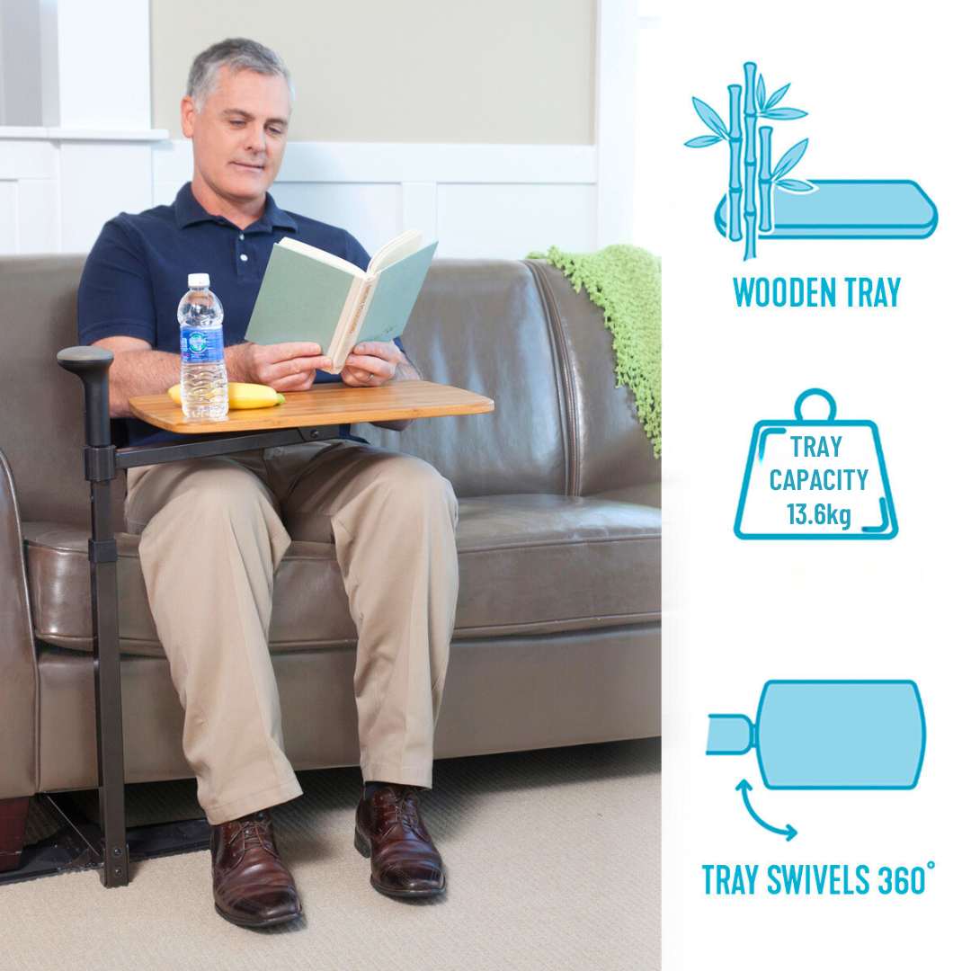 Man reading a book and using the omni tray
