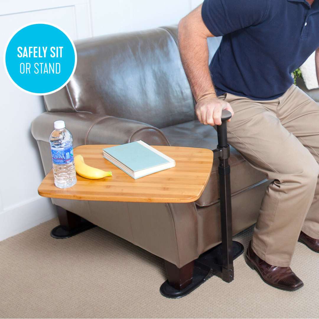 man using the Omni tray to stand up