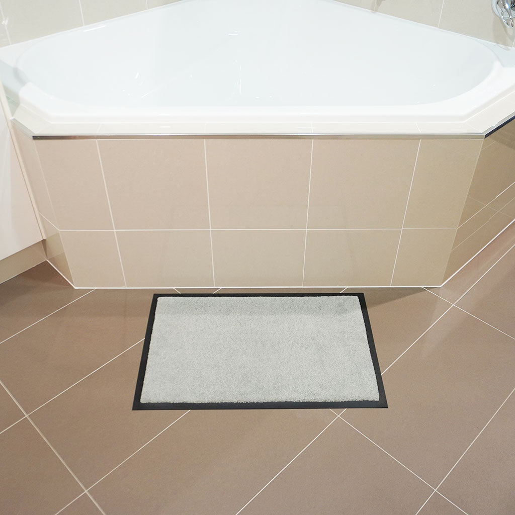 Betterliving dove grey small non-slip mat in front of bathtub