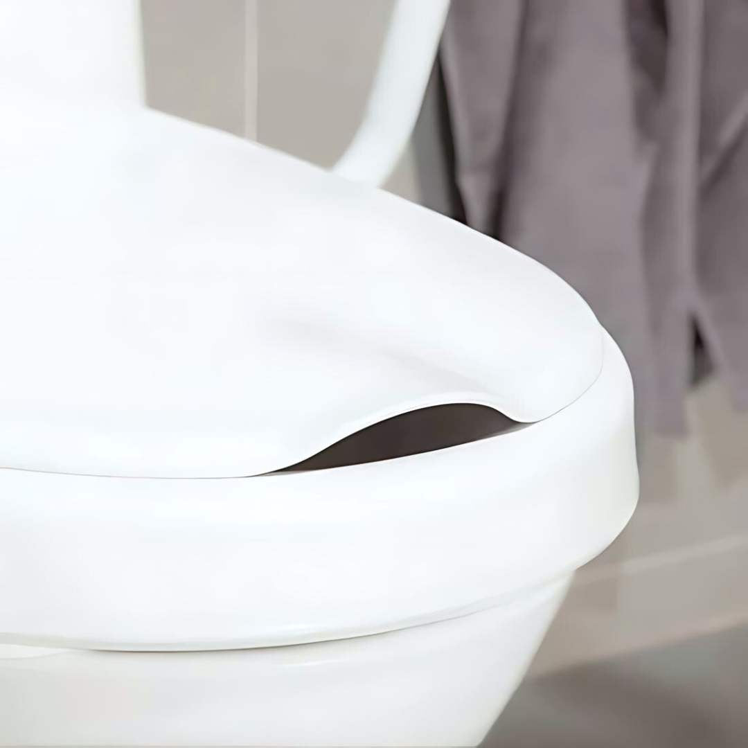 Etac Hi-Loo toilet seat raiser with armrests close up view of the toilet lid