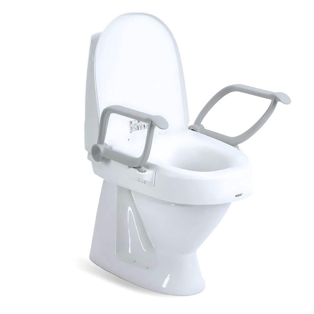 Etac Cloo adjustable height toilet seat raiser mounted on toilet with lid open