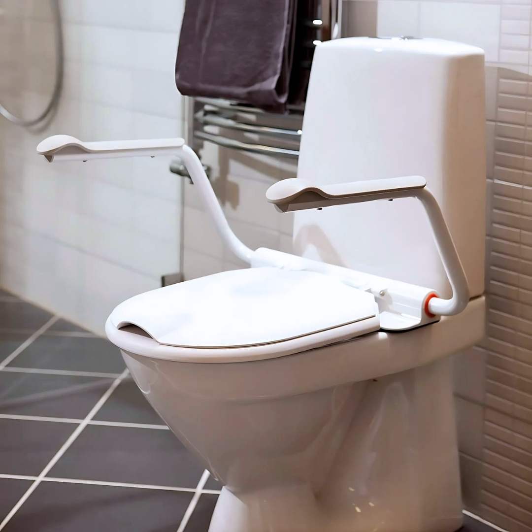 Etac supporter toilet seat with armrests in environment