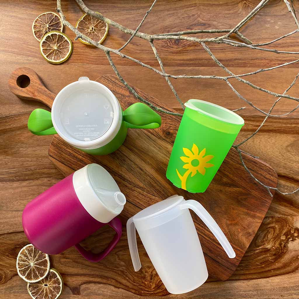 various cups and mugs with beaker lid attachments