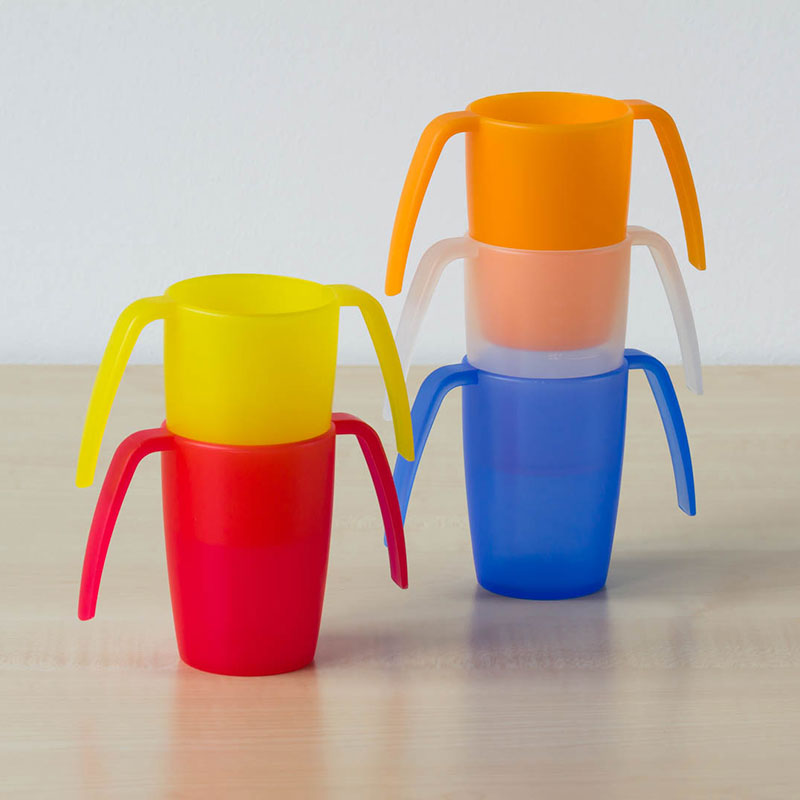 two handled cups stacked in two piles