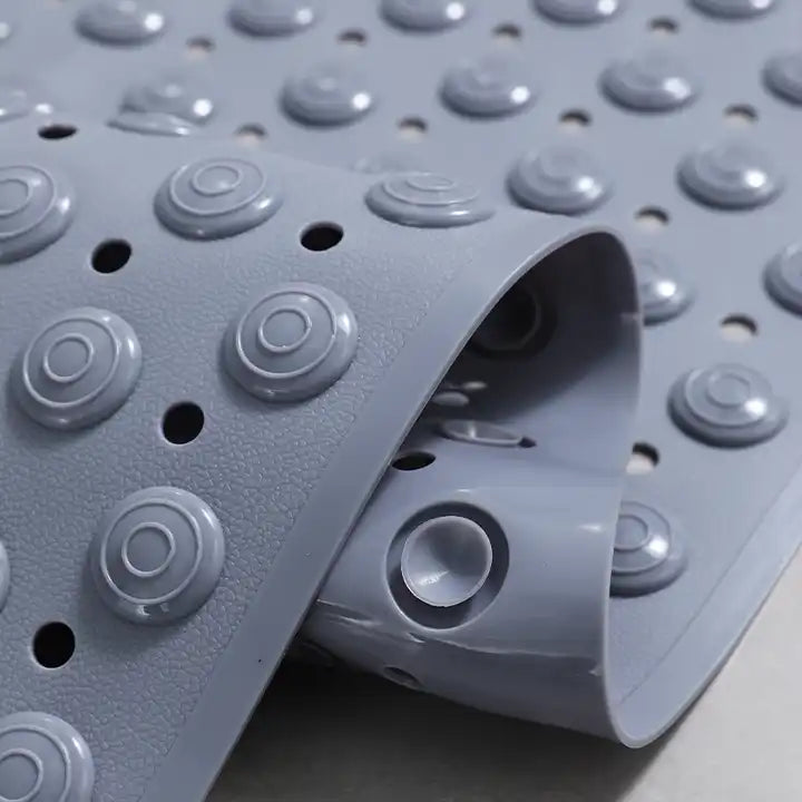 bath mats showing suction caps underneath