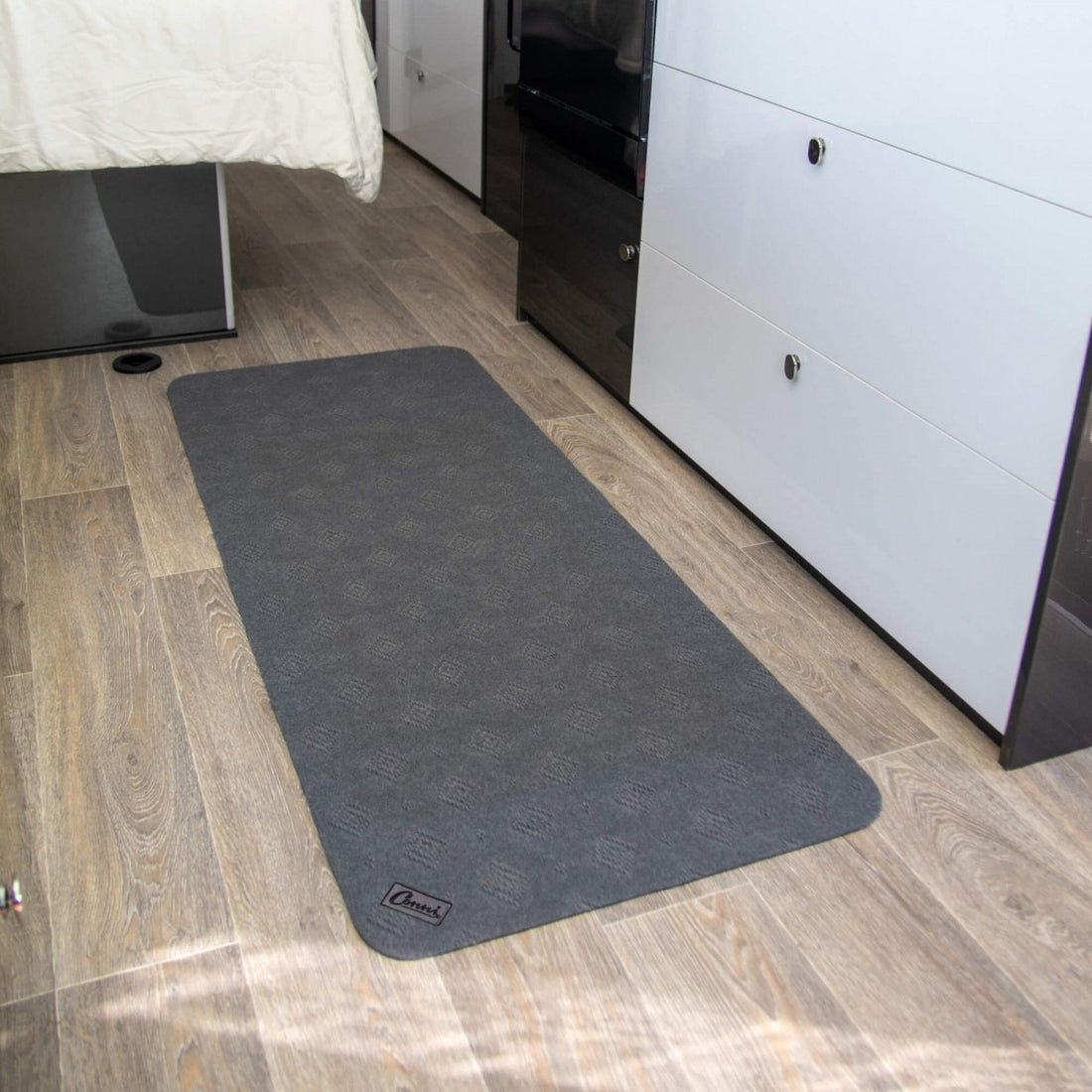 Grey Conni non-slip runner in front of drawers