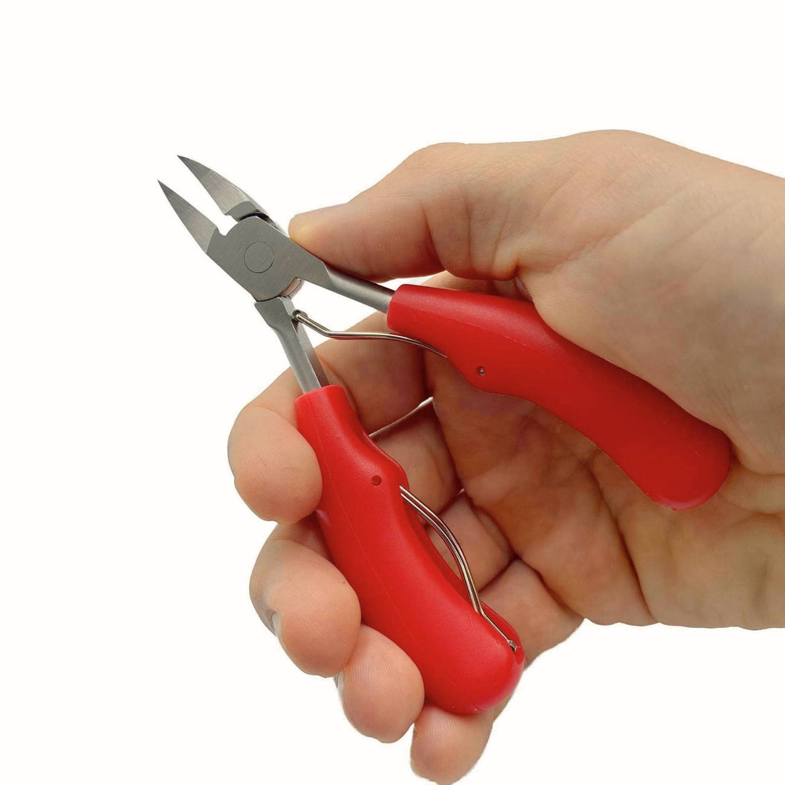 hand holding red thick handled nail clippers