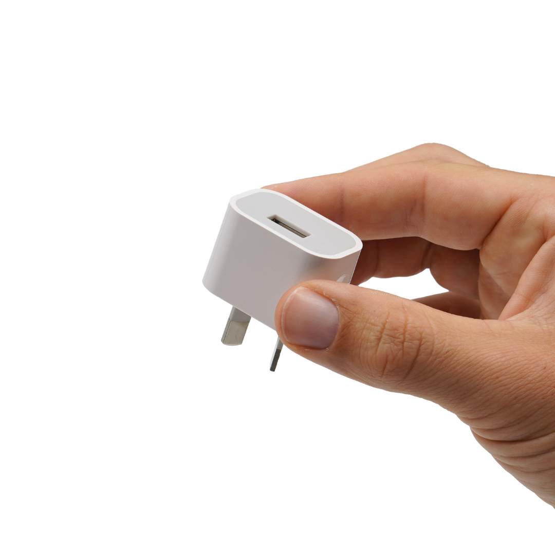 USB charger held in hand