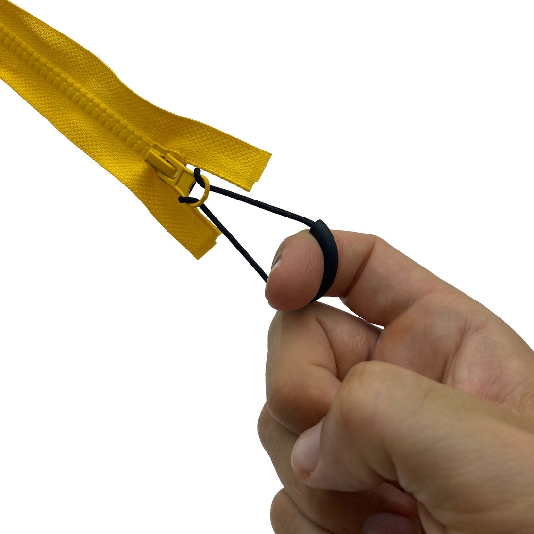 hand pulling zipper pull of yellow zip